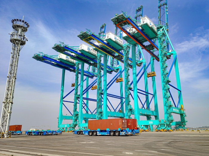 百台集群，百万箱量！PG电子平台AGV打造智慧港口“中国标杆”